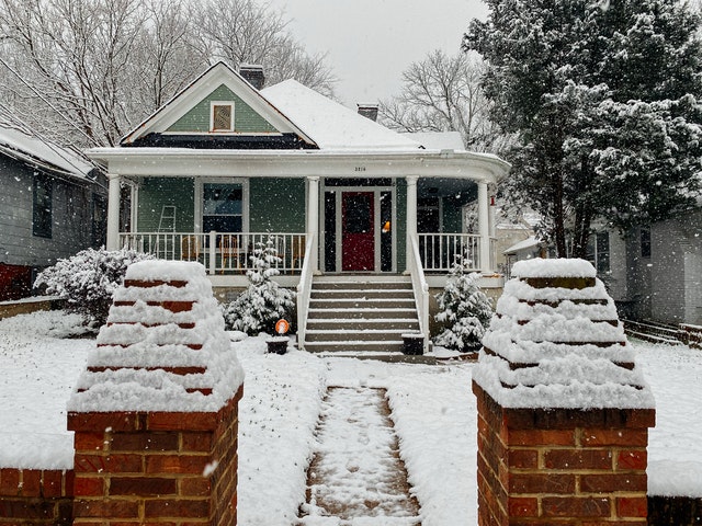 A house covered in snow.