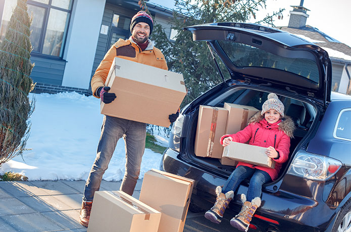 Family Moving During the Winter in Snow