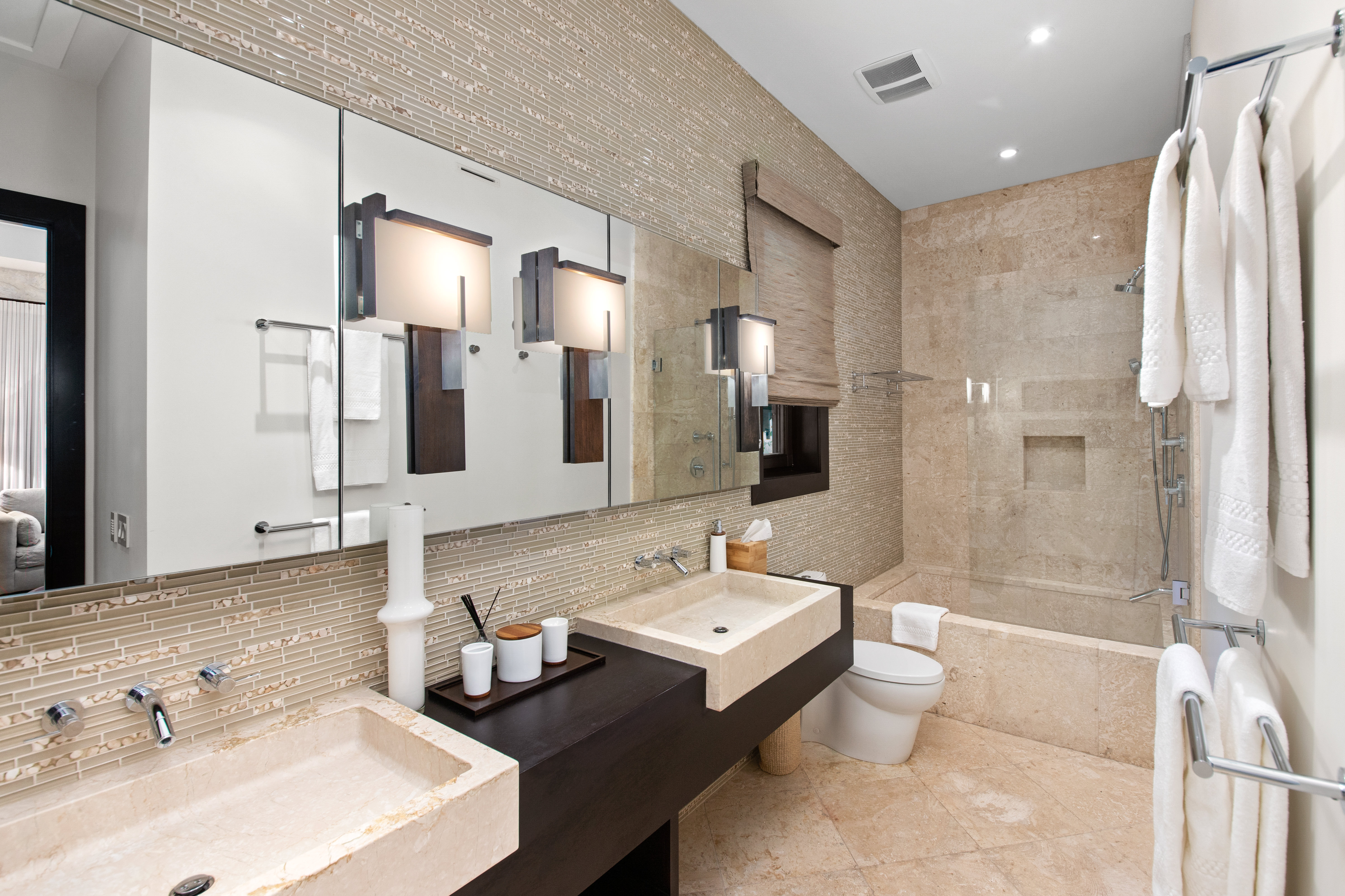 Large Bathroom with Dual Sinks, Shower, and Tub