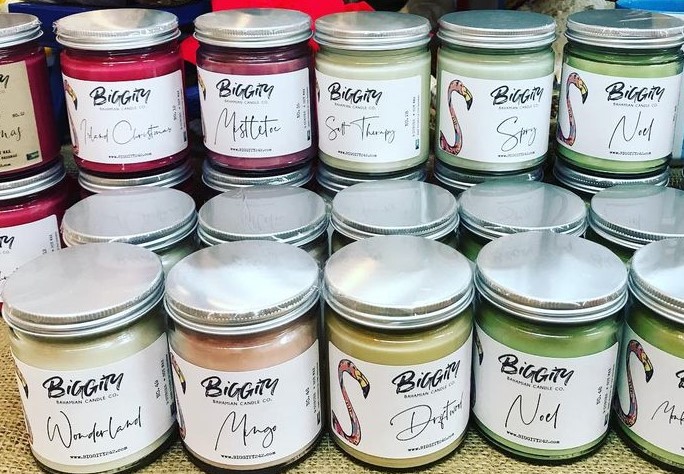 Collection of candle containers showing scents