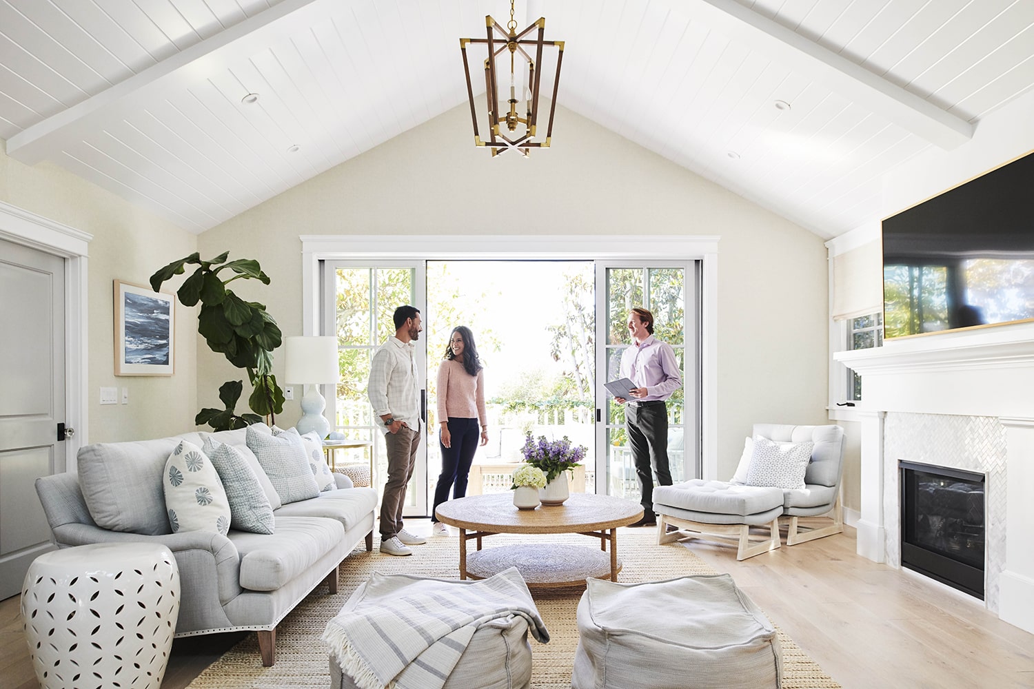 Realtor with Clients in home