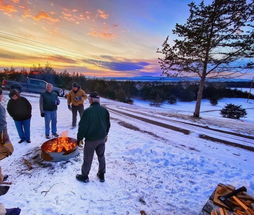 Sunset bonfire with friends in south hero