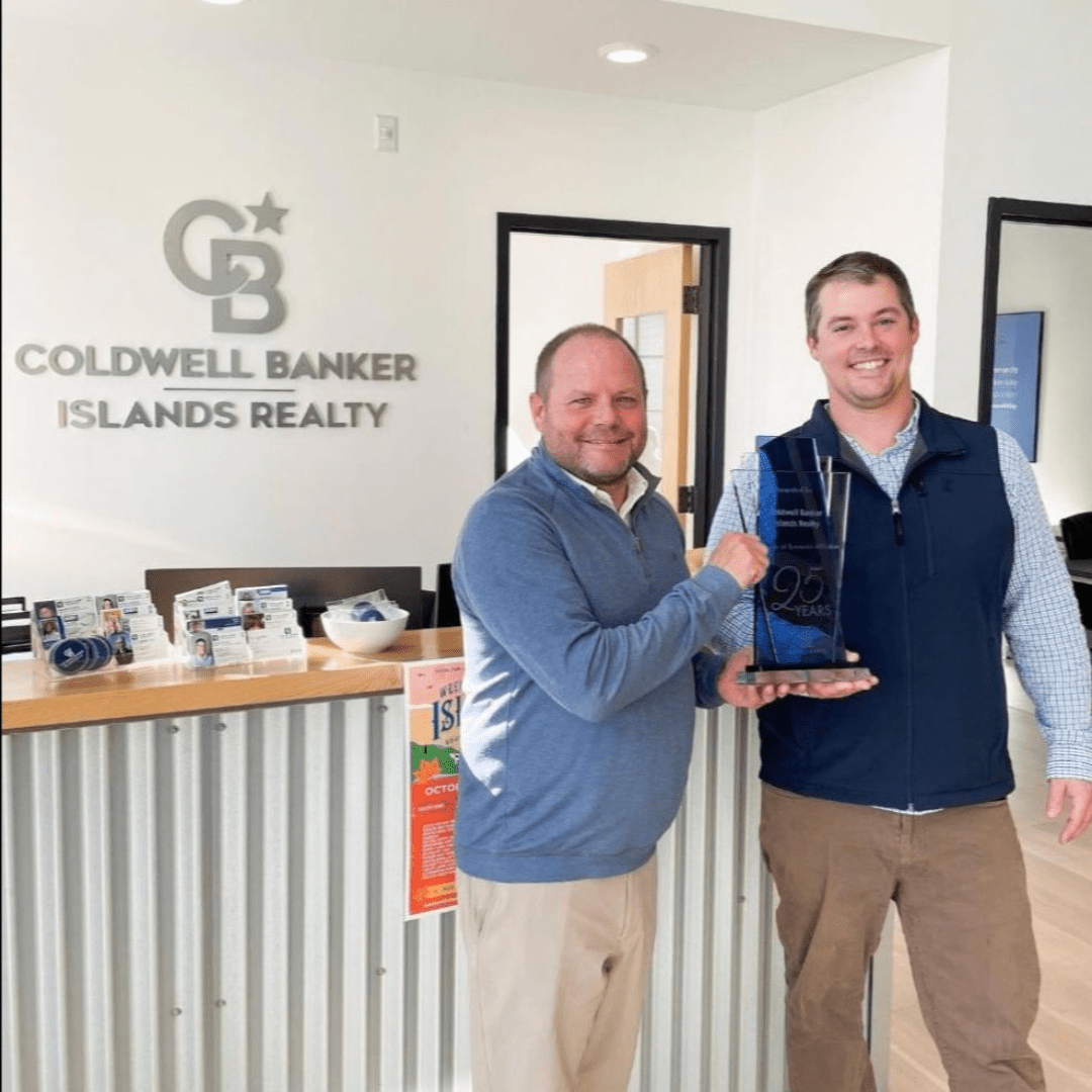 Owners Evan Potvin and Franz Rosenberger Celebrate 25 Years with Coldwell Banker