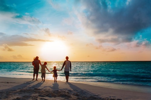 Happy Family On The Beach in Rhode Island