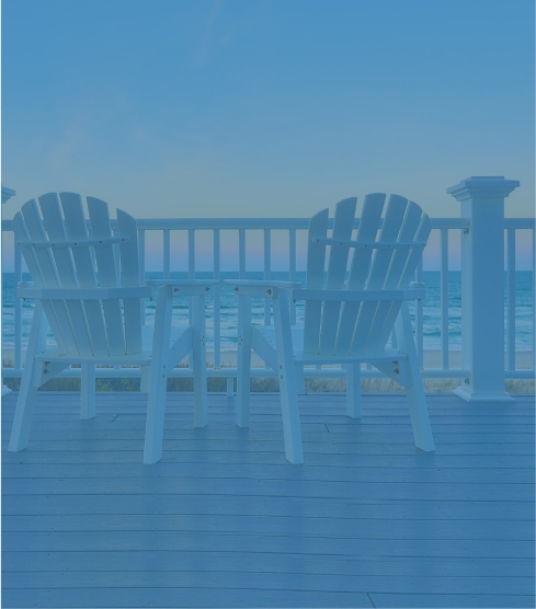 porch chairs ocean sunset background