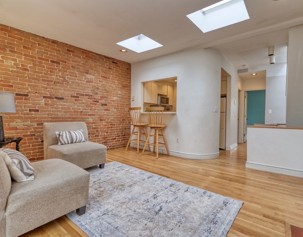 Family Room with Exposed Brick