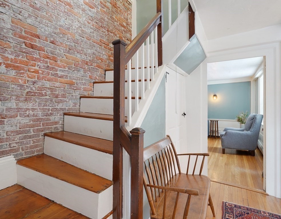 Staircase with Exposed Brick