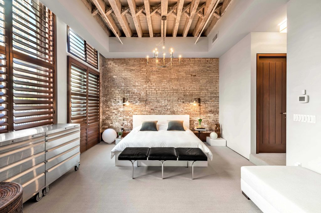 Bedroom with Exposed Brick
