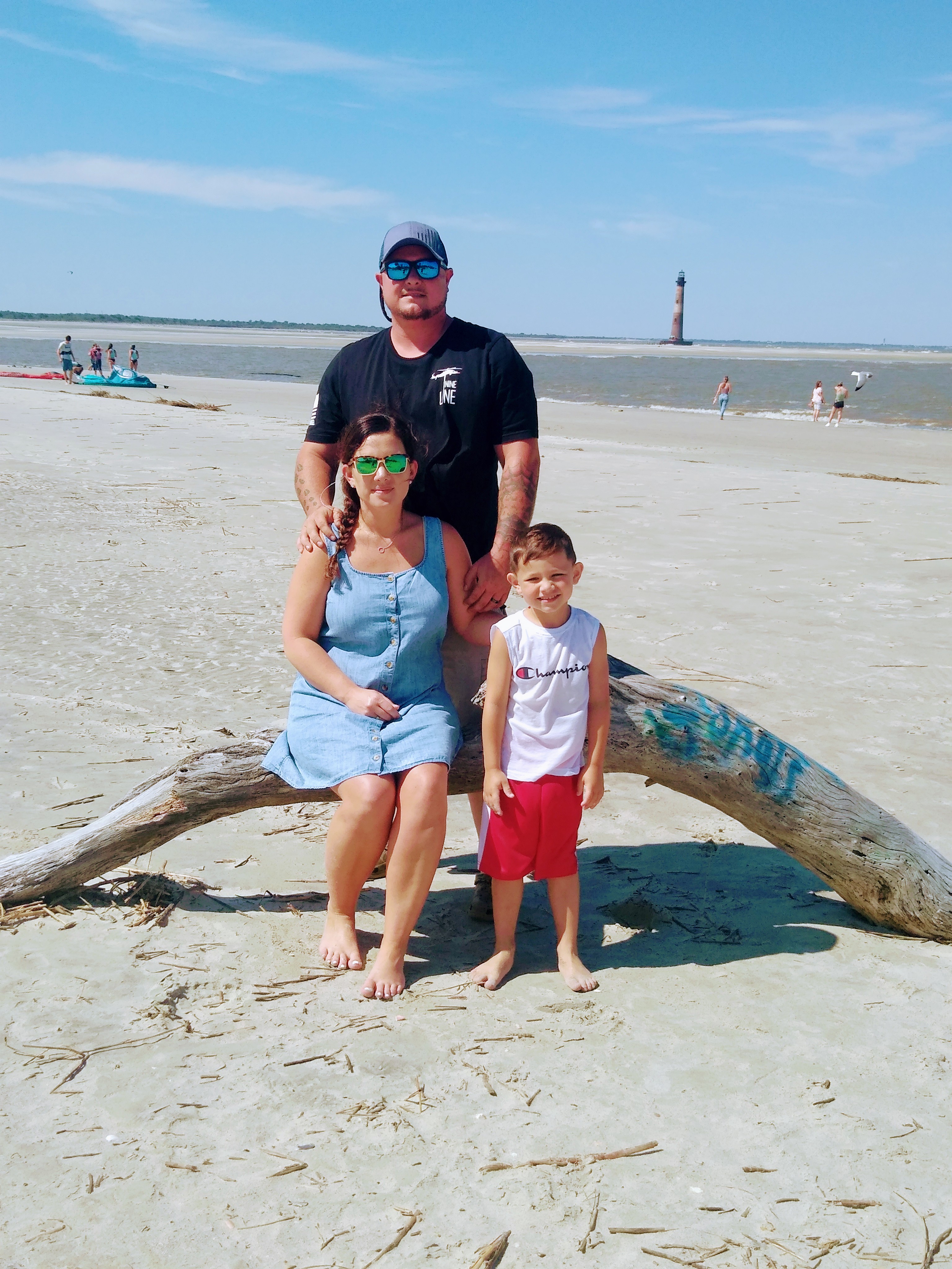 DJ with husband and youngest son on beach