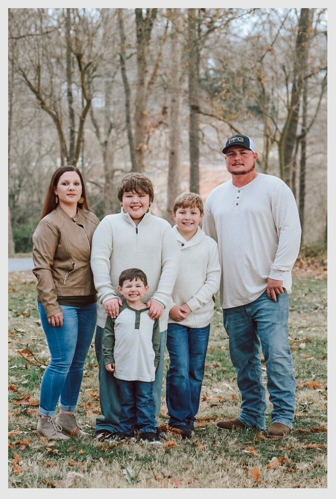 DJ with whole family outside