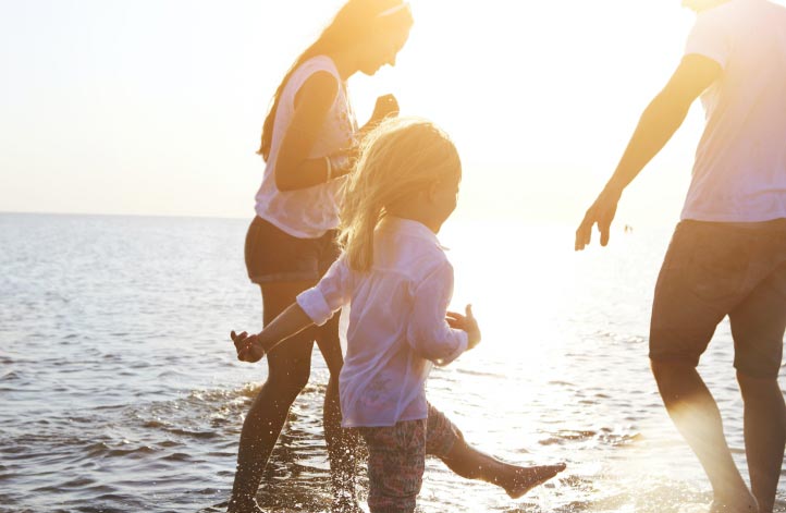 child playing on beach