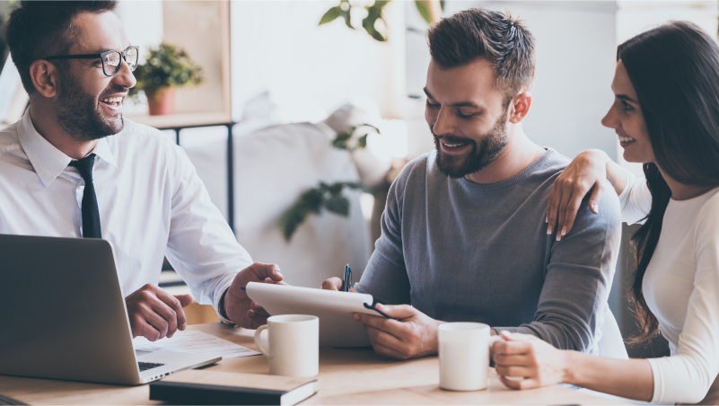 Real Estate Agent meeting with clients