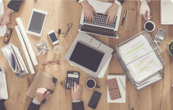 Man in suit jacket with white shirt and glasses