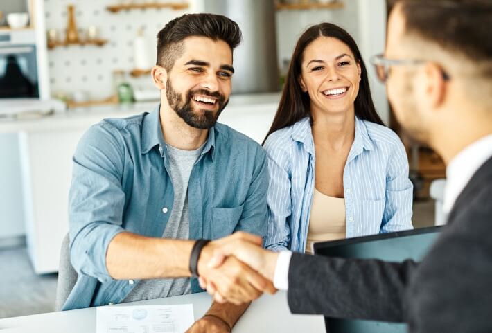 woman staring out of window