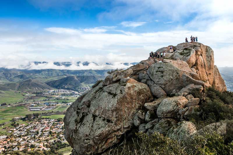 hikers on top of rocky mountain