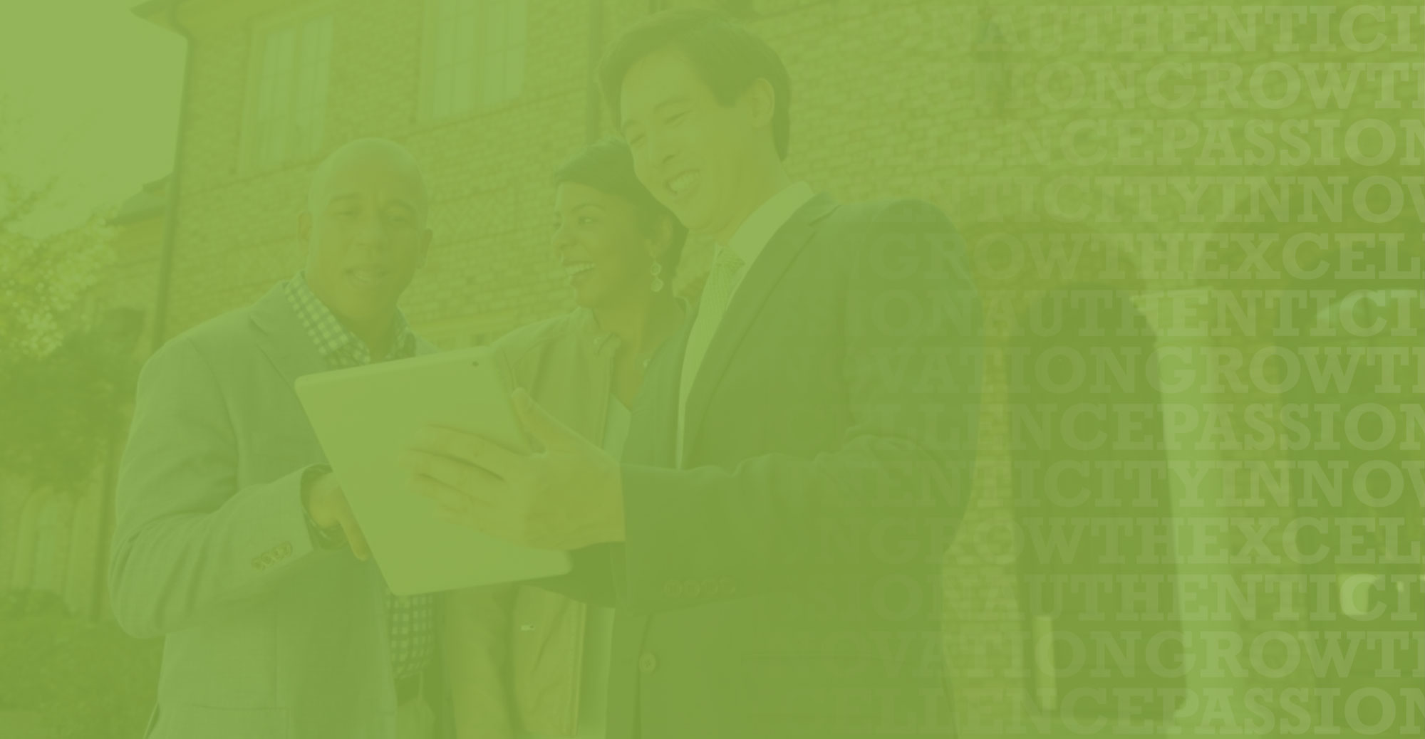 two women and a man in a formal attire laughing together