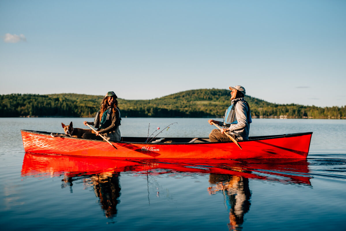 couple are swimming on the boat