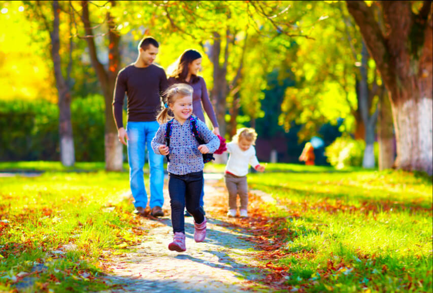 Happy family are walking in the Park
