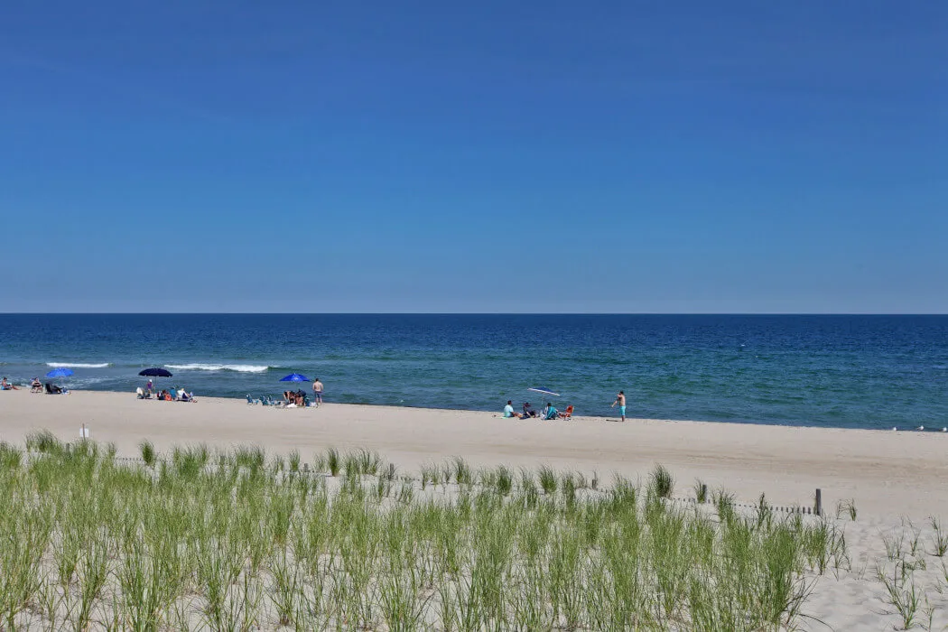 People enjoying a nice day at the beach in North Beach, New Jersey