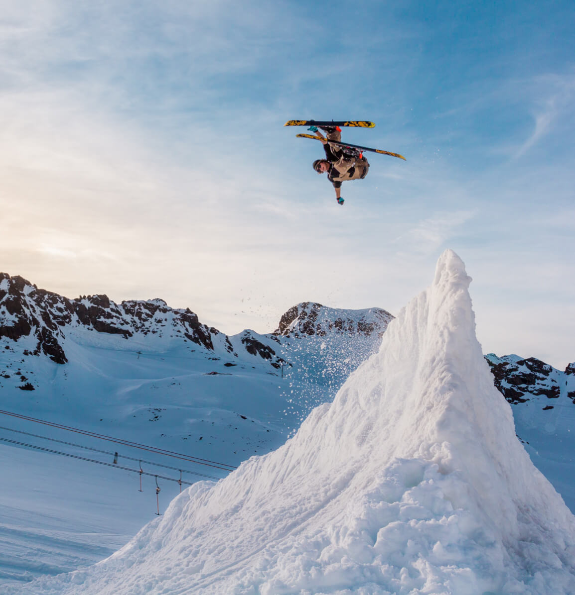 someone is doing a flip on  the ski