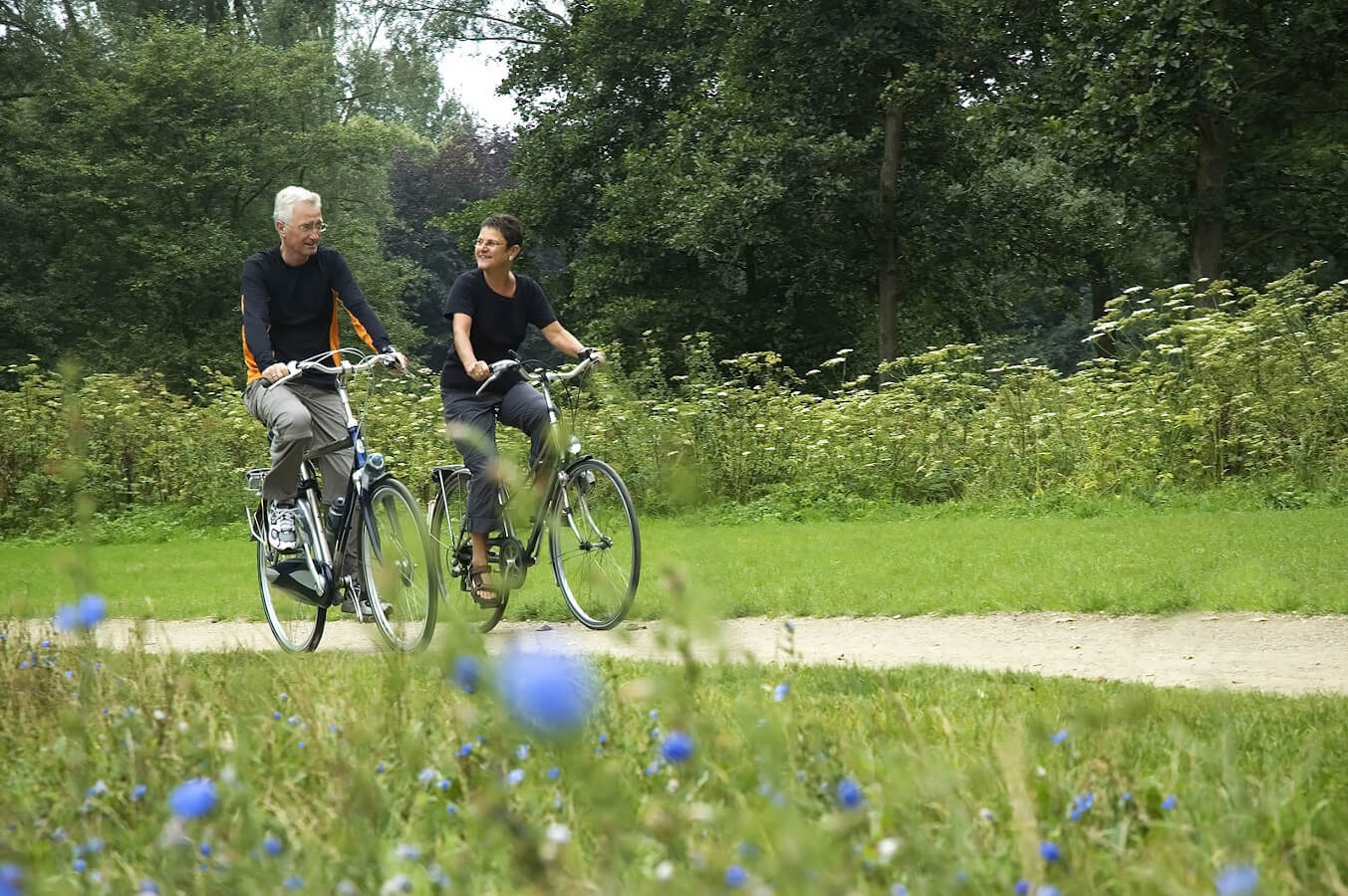 Grandfather and Grandmother on bycicle