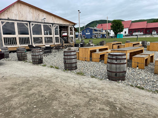 wooden building with outdoor seating