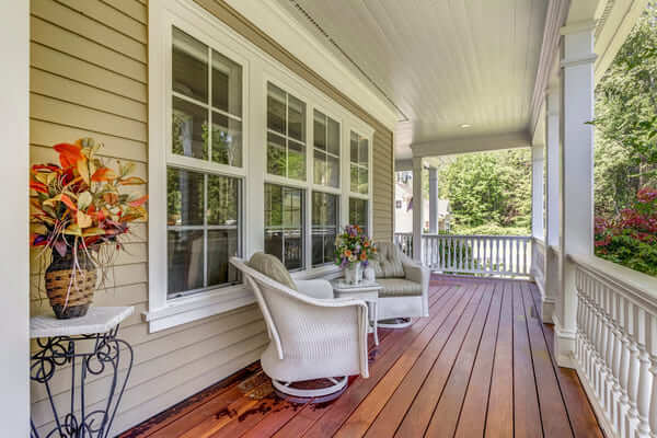 Large country home with wrap-around deck