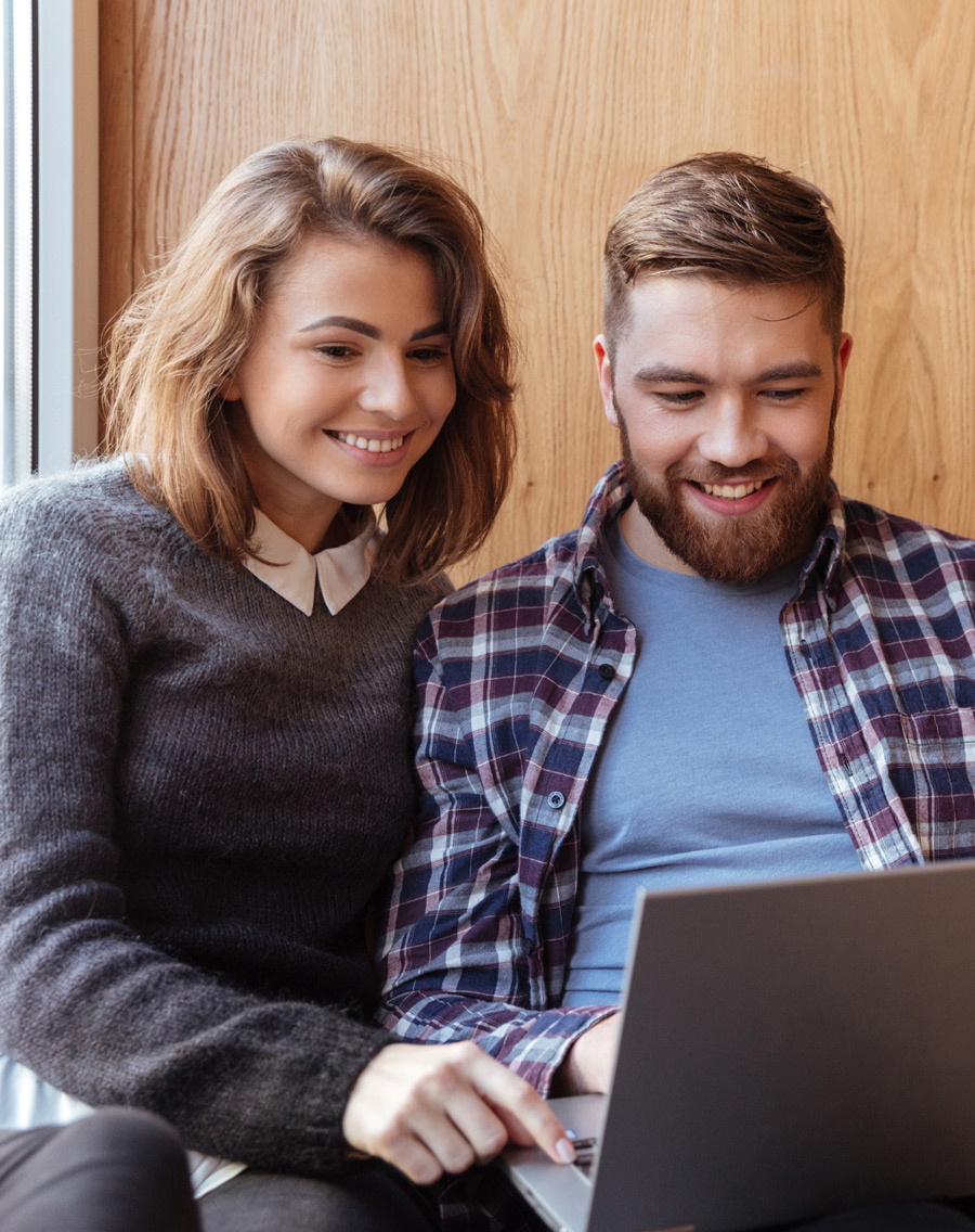 Couple using a laptop