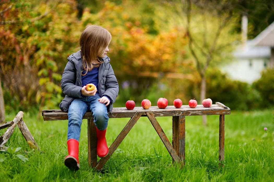 Little girl with apple
