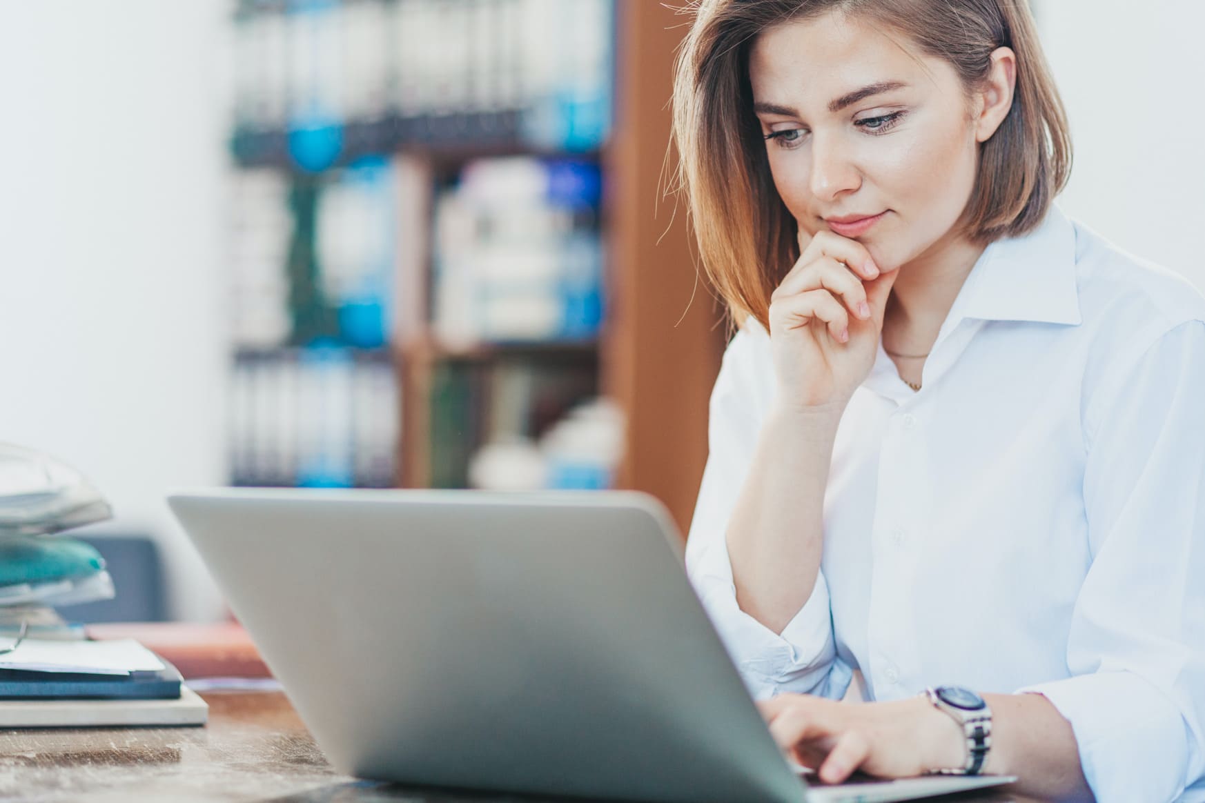 Woman working on a laptop