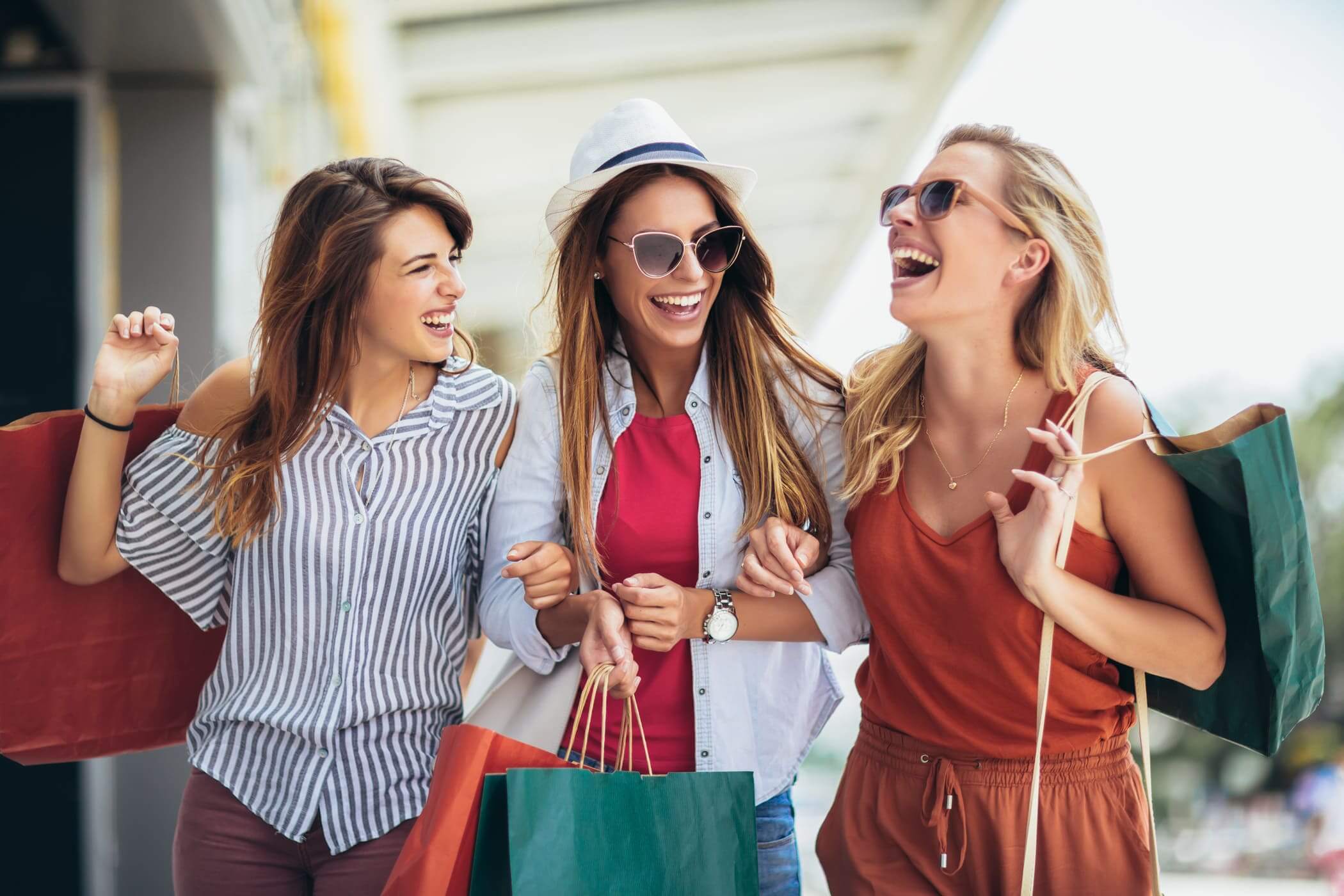 Three friends out shopping together
