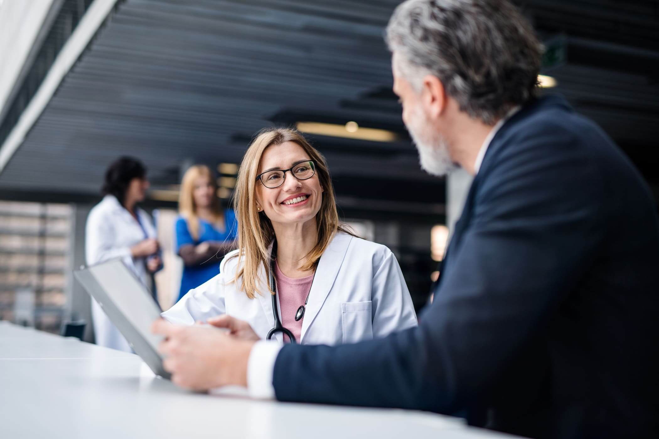 Doctor talking to a patient.