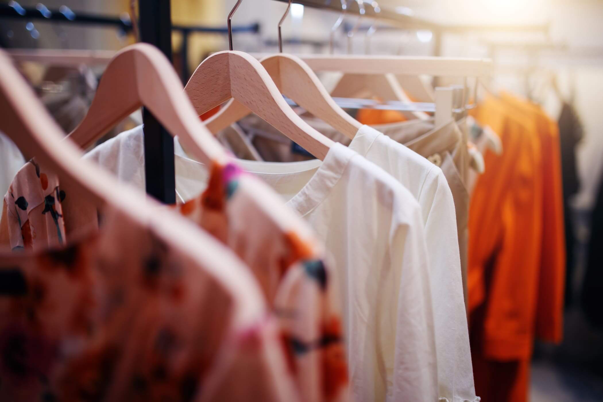 Clothing on hanger at modern shop boutique