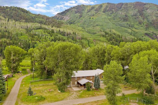 A view of 200 E State Street, Marble, CO with mountain vistas in the background
