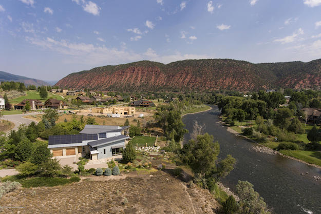 A view of 416 River Bank Lane, Glenwood Springs, CO, on the banks of the Roaring Fork River.