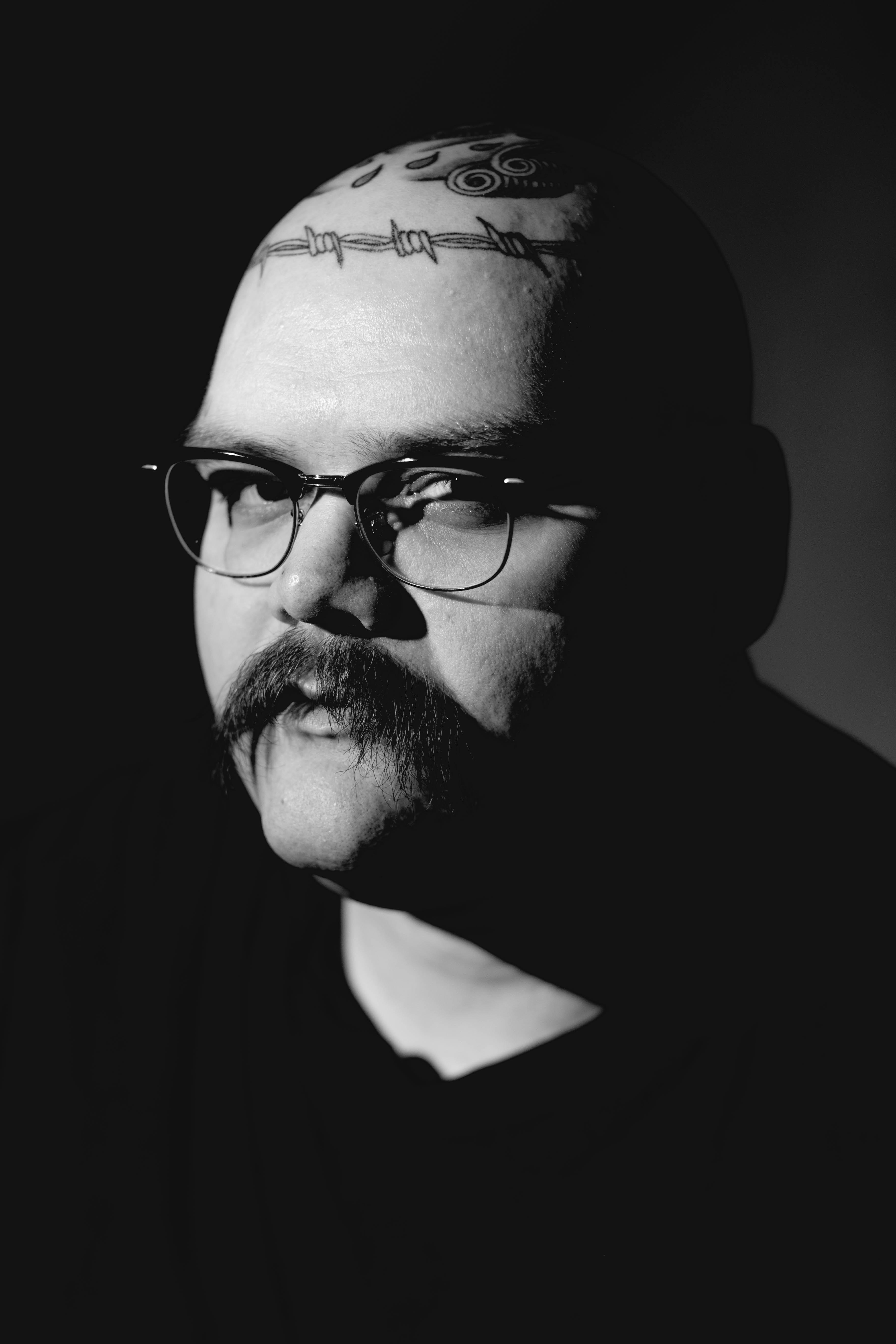 John Moreland Logo