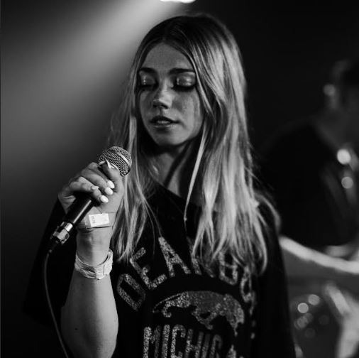 SUNNIVA with KYLIE V & FROWNLINE (SOLO) Logo