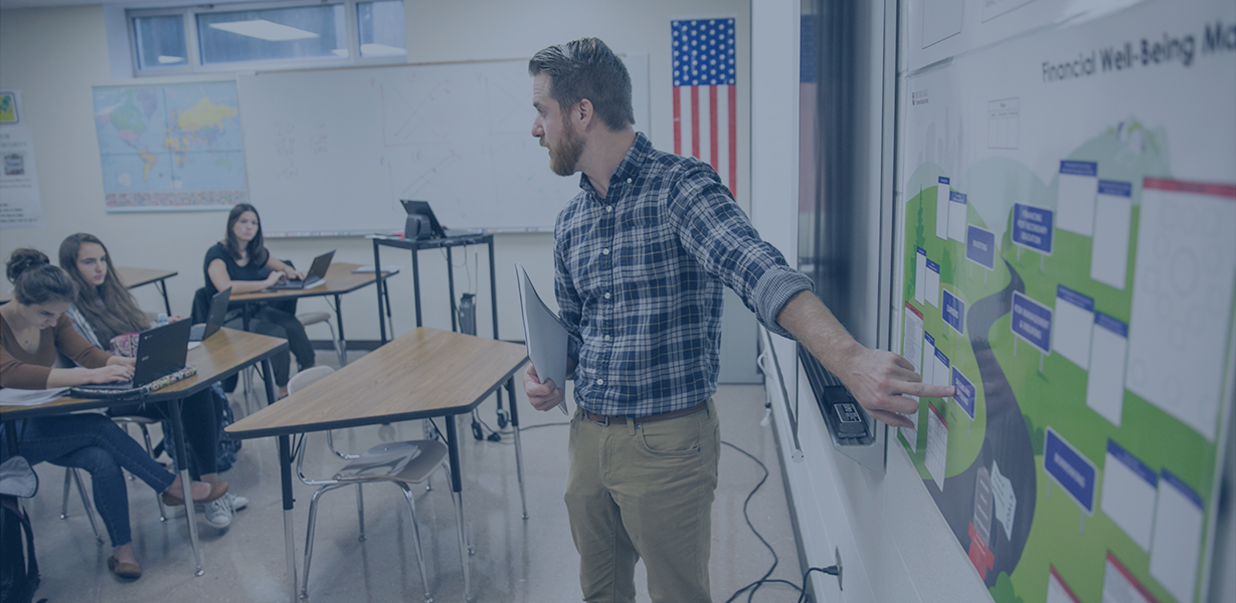 Teacher showing on the whiteboard