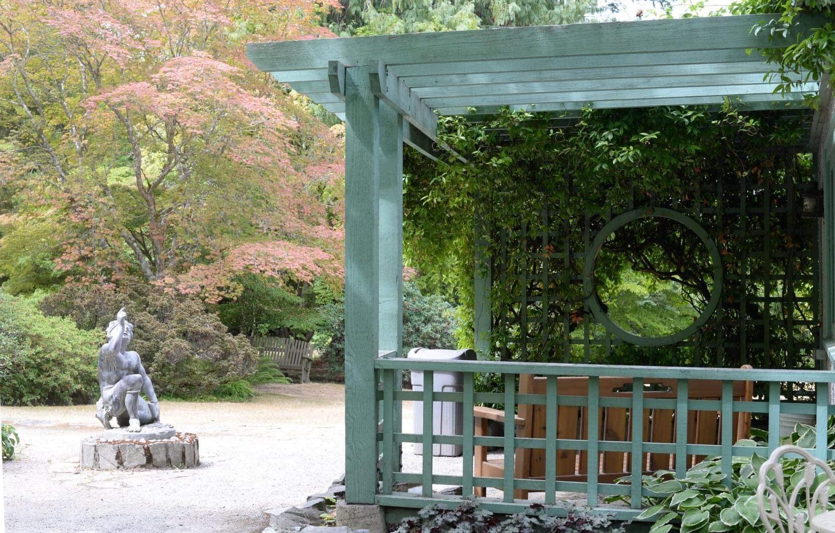 pergola and garden statue