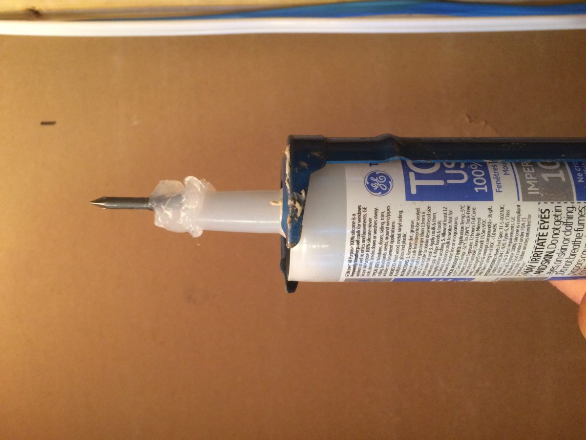 Reopening and Cleaning a Caulking Tube Nozzle Fine Homebuilding