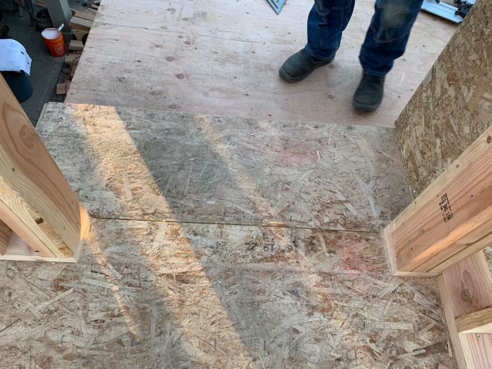 Walkable, thin, attractive waterproofing for an exposed OSB step Fine