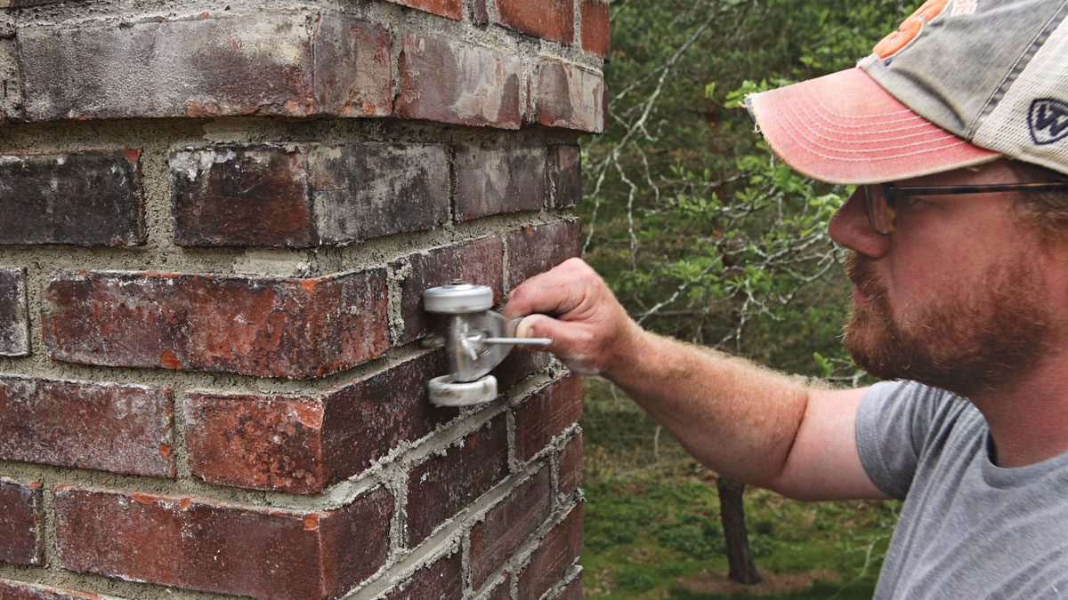 Tool the joints. There are various methods, styles, and reasons for using particular joints. Here, I used a joint raker to create clean, flat joints recessed about 3⁄16 in. from the brick surface.