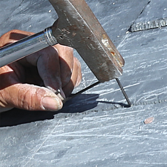 drive a black anodized, stainless-steel slate hook into the joint