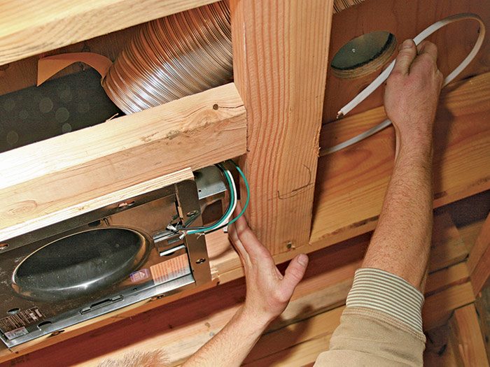 1 Staple cable no more than 1 ft. from the fan box.