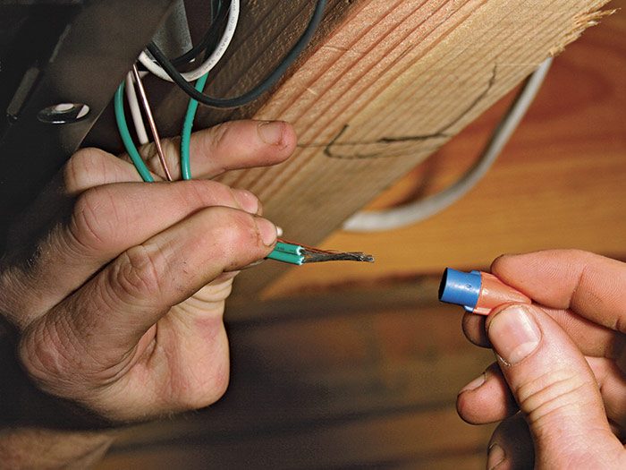 3  Splice like-wire groups, starting with the ground wires, then neutrals, then hot wires. (At this stage the wires are not energized.)
