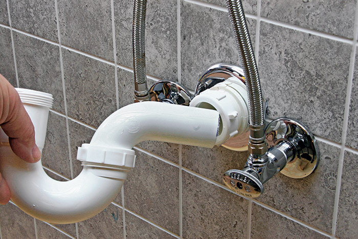 remove the complete P-trap assembly