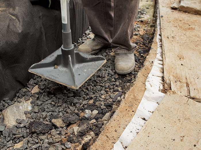 Setting the Footing for a Dry-Stack Retaining Wall - Fine Homebuilding