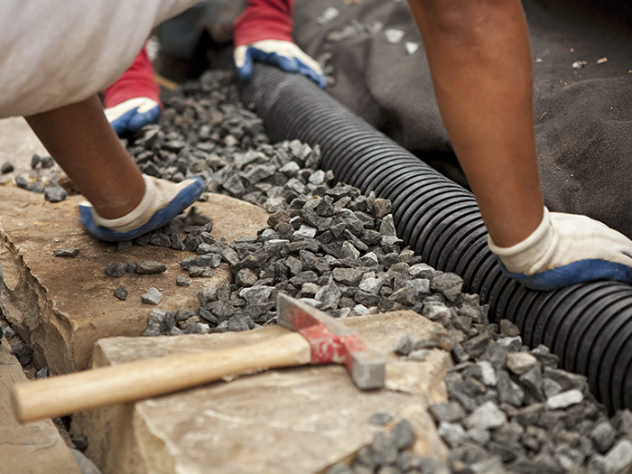Adding a Drain Line for a Dry-Stack Retaining Wall - Fine Homebuilding