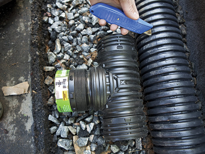 Adding a Drain Line for a Dry-Stack Retaining Wall - Fine Homebuilding