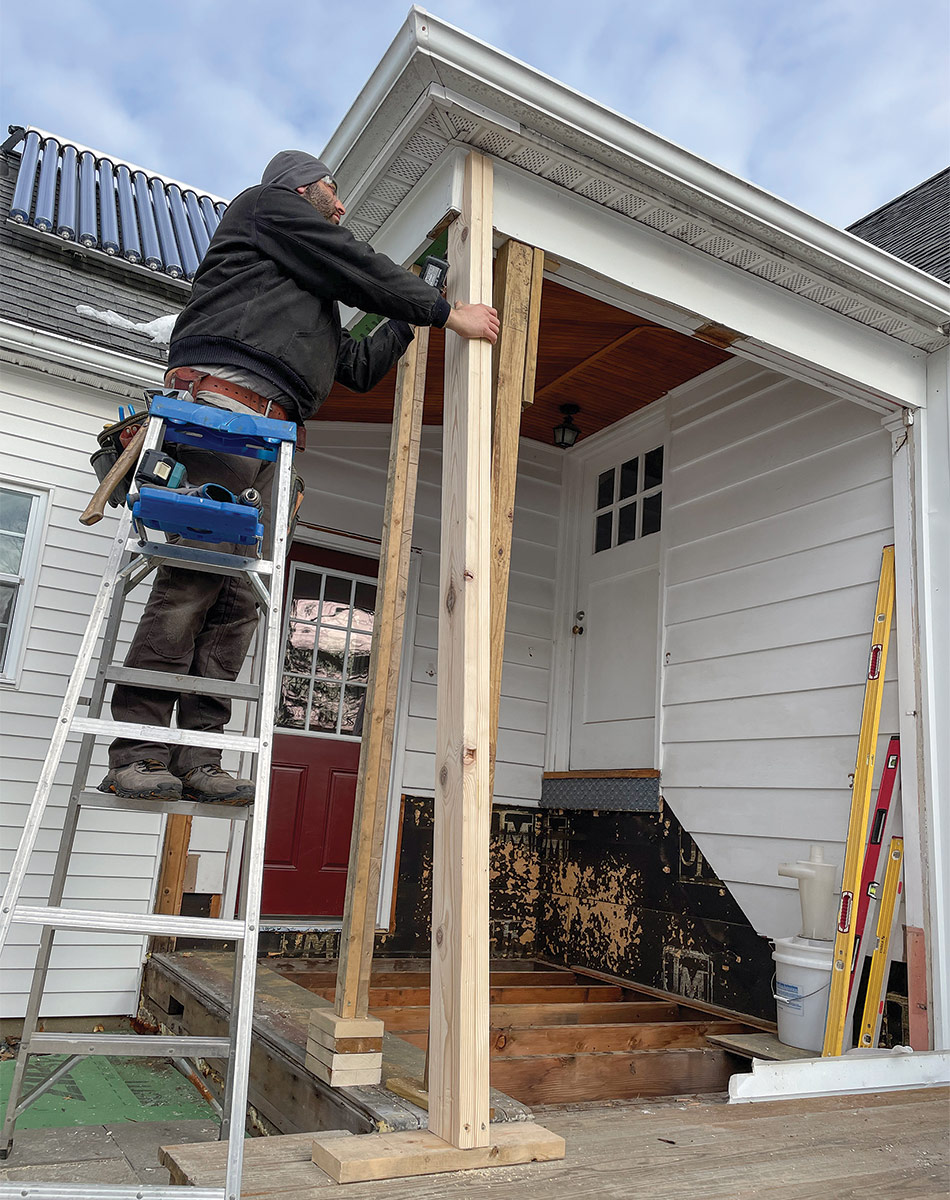 installing temporary support post on porch